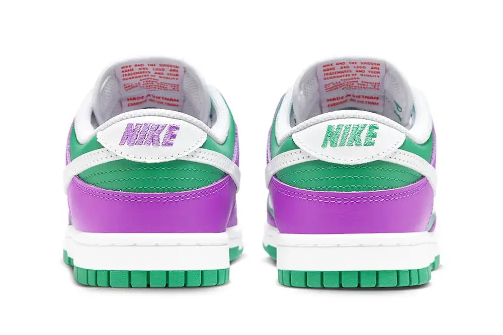 Nike Dunk Lows in Stadium Green and Fuchsia Colorway
