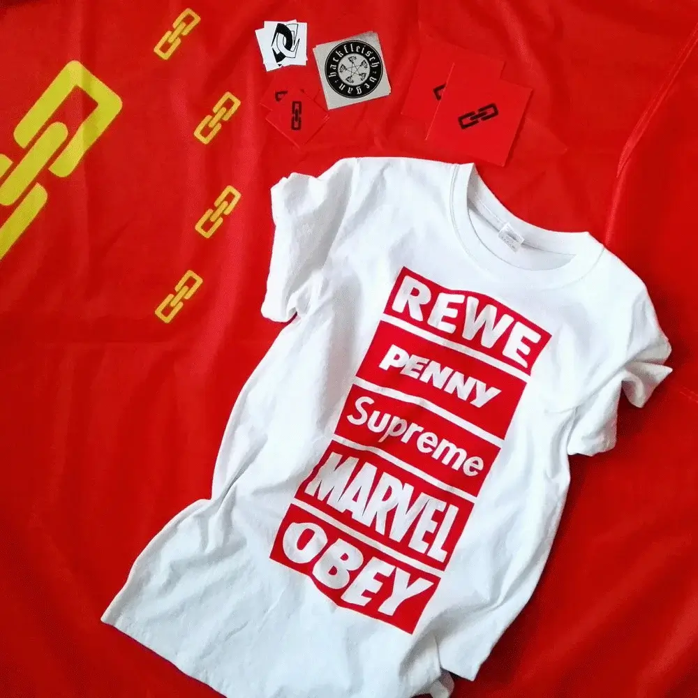 Rewe x Penny x Supreme x Marvel x Obey Shirt | Hot Razzberry Rewe x Penny x Supreme x Marvel x Obey Shirt