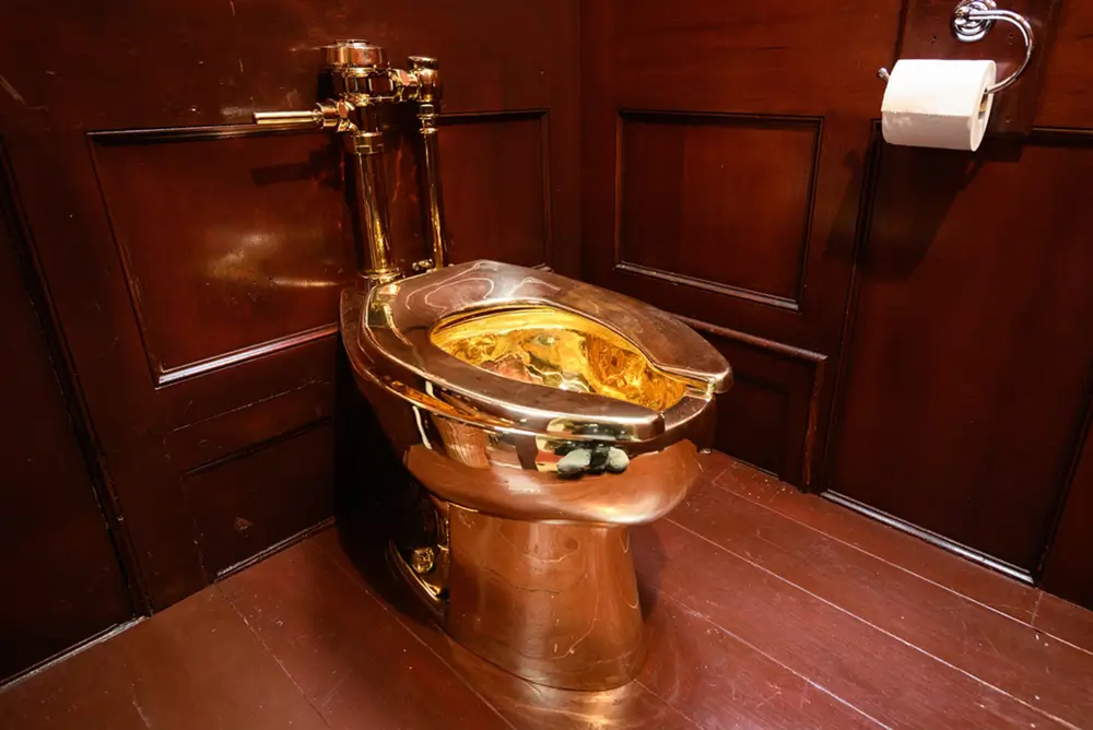 Maurizio Cattelan's Gold Toilet Stolen in Under 5 Minutes
